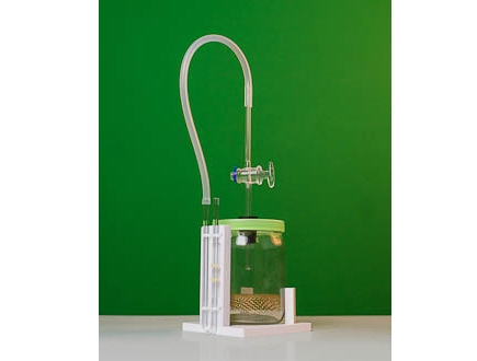 Прибор для обнаружения дыхательного газообмена у растений и животных